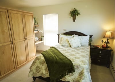 Cozy resident bedroom with warm lighting