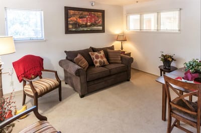 Cozy living area with a sofa and artwork