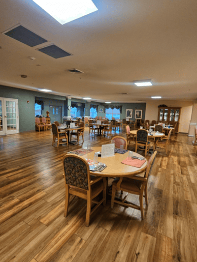 Dining area in a senior living facility with tables