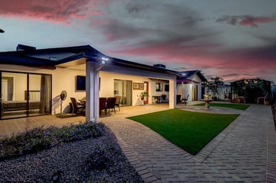 Outdoor space with a patio and garden area