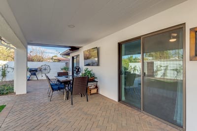 Outdoor living space with seating and plant decor