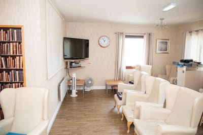 Cozy common area with comfortable seating and television