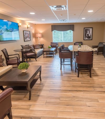 Bright common area with comfortable seating and decor