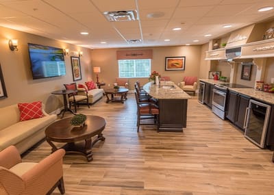 Bright common area with seating and refreshments