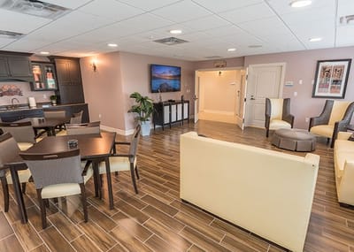 Interior view of a common area with seating and tables