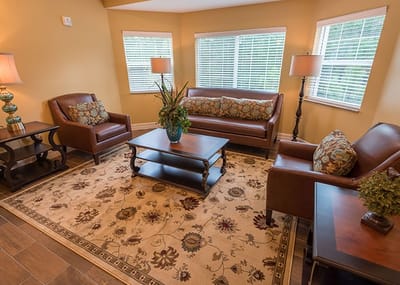 Cozy common area with seating and natural light