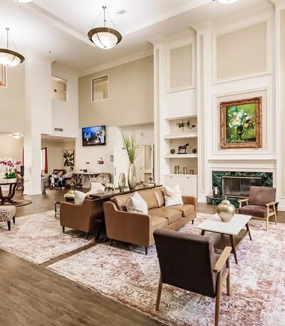 Interior common area with residents and elegant decor