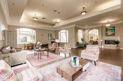 Bright common area with comfortable seating and natural light