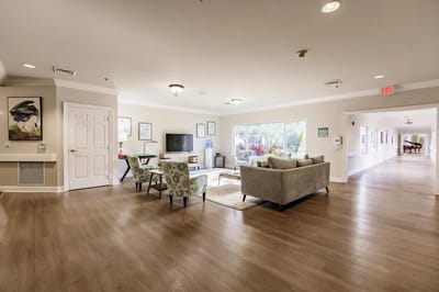 Bright common area with seating and artwork