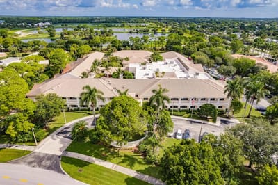 Aerial view of Courtyard Gardens with surrounding greenery