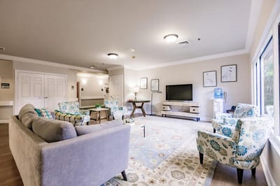 Cozy common area with comfortable seating and TV