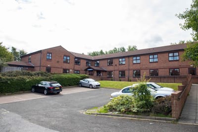 Exterior view of Marigold Nursing Home building