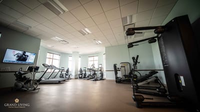 Fitness area with gym equipment in a senior living facility