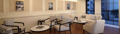 Bright common area with seating and artwork