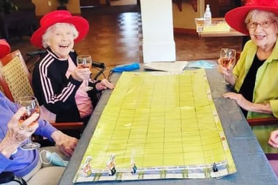 Residents enjoying a game at the community center