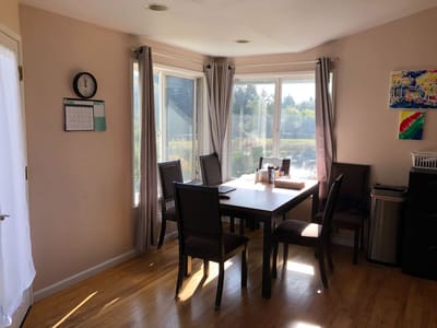 Interior dining area with a table and chairs
