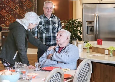 Residents enjoying breakfast in a dining area