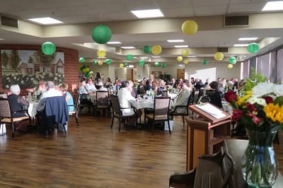Residents enjoying a gathering in a decorated interior