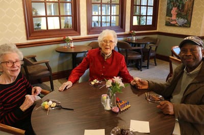 Residents enjoying ice cream in the dining room