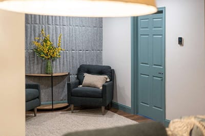 Comfortable seating area with flowers in a senior living facility