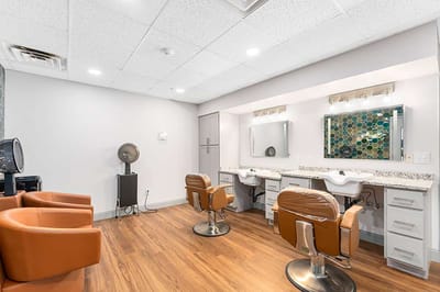 Hair salon with styling chairs and mirrors