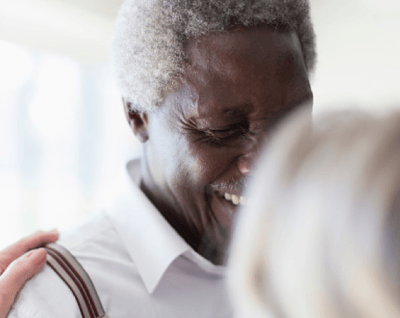 Happy resident engaging with staff