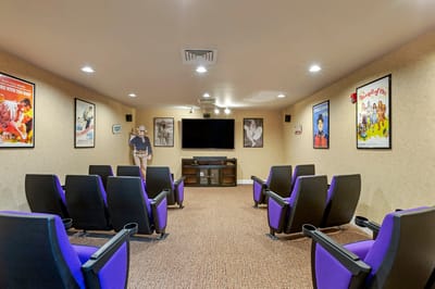 Activity room with movie seating and posters