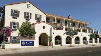 Exterior view of the facility with logo