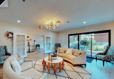 Bright common area with seating and natural light