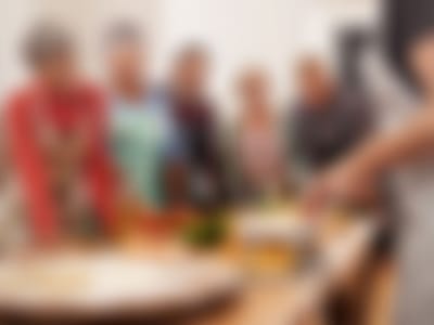Seniors cooking in a group activity setting