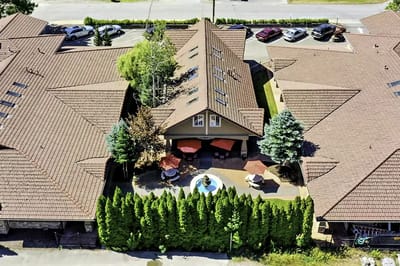 Aerial view of outdoor space with pool and seating