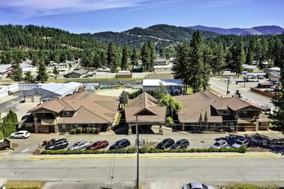 Aerial view of Pinehurst Senior Community facilities surrounded by nature