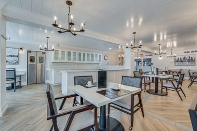 Bright dining area with tables and chairs