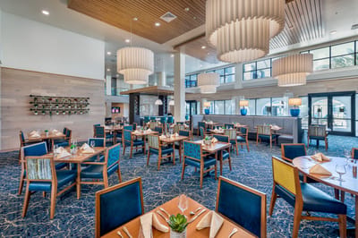 Elegant dining room setup with tables and chairs