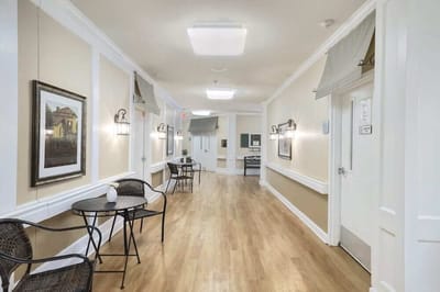Bright interior hallway with seating and decorations