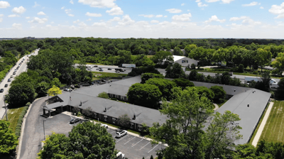 Aerial view of Rittenhouse Village at Portage surrounded by greenery.