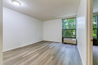 Bright and airy interior room with window