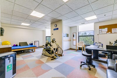 Interior view of a fitness area with exercise equipment