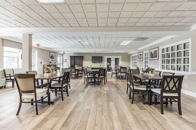 Dining room with tables and chairs arranged neatly
