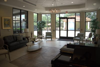 Bright and welcoming lobby with seating and outdoor view