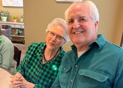 Residents smiling together in a cheerful common area