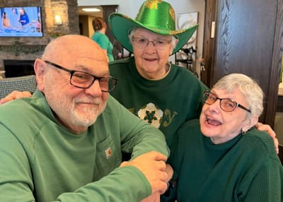 Residents enjoying a festive gathering in a common area