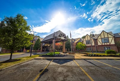 Exterior view of Heritage Villas with a sunny sky