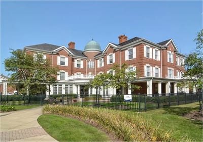 Exterior view of Heritage Villas nursing home with gardens