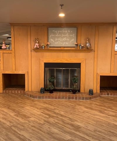 Cozy common area with fireplace and decorations