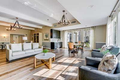 Bright common area with seating and natural light