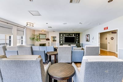 Common area with comfortable seating and a television