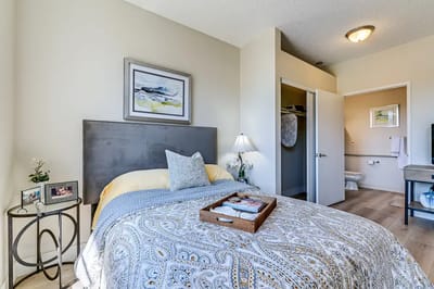 Private resident room with bed and decor