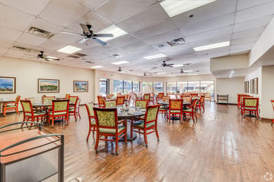 Bright dining room with tables and chairs
