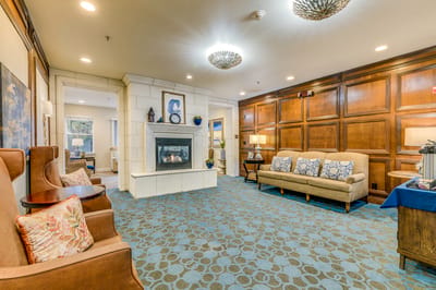 Interior common area with seating and fireplace
